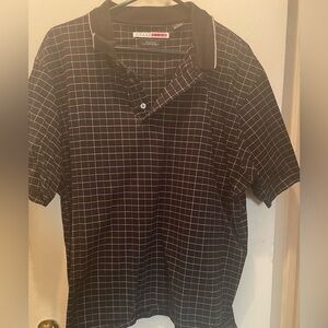 Grand slam men polo XL. Black base with checkered lines in purple and white
